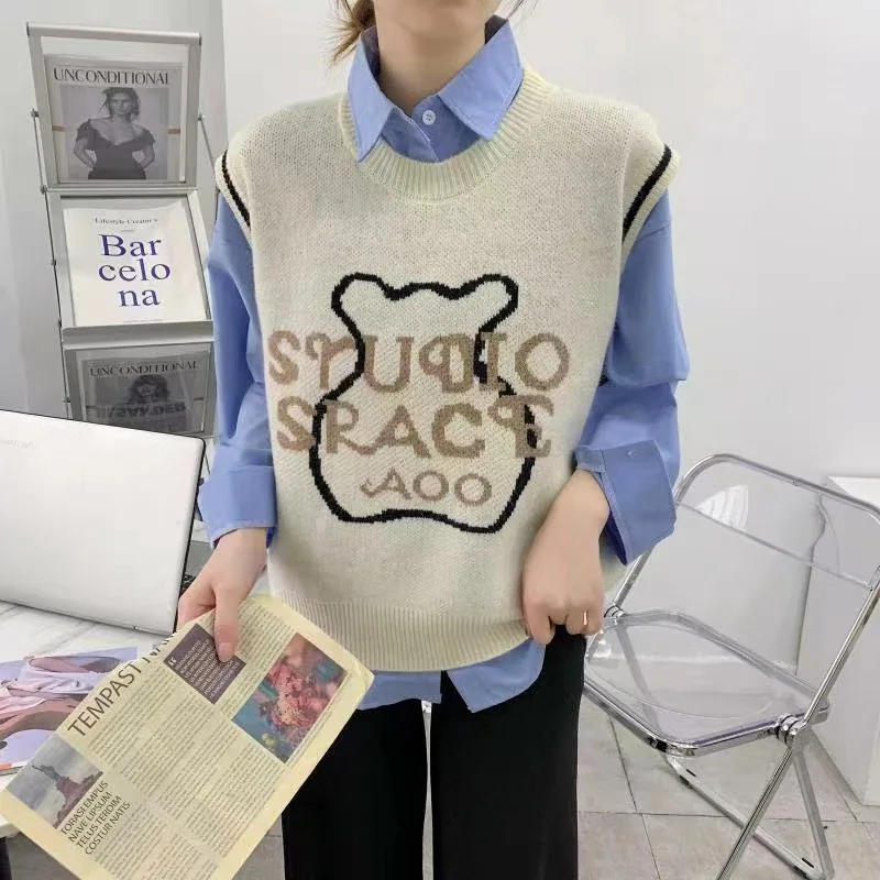 2022 spring autumn college style O-neck knitted vest female Korean version loose jacquard cartoon sweater cardigan top
2022 spring autumn college style O-neck knitted vest female Korean version loose jacquard cartoon sweater cardigan top