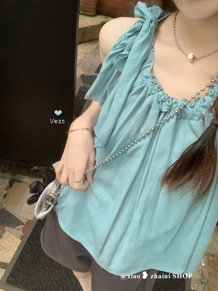French Chic bandage neck suspender vest women's summer design sense, the minority wears a baby shirt sleeveless top
French Chic bandage neck suspender vest women's summer design sense, the minority wears a baby shirt sleeveless top