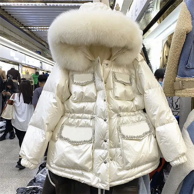 Shiny Padded Jacket Women's 2022 Winter New Heavy Industry Big Fur Collar Diamond Laser Coat 
Shiny Padded Jacket Women's 2022 Winter New Heavy Industry Big Fur Collar Diamond Laser Coat