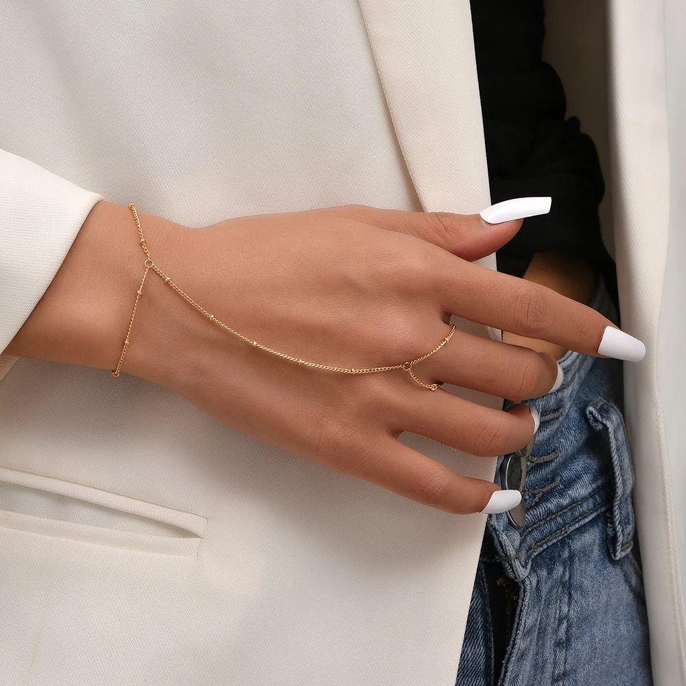 Creative Tiny Chain Bracelet Finger Rings For Women Gold Color Link Chains Connecting Hand Harness Bracelets Jewelry Gift
Creative Tiny Chain Bracelet Finger Rings For Women Gold Color Link Chains Connecting Hand Harness Bracelets Jewelry Gift