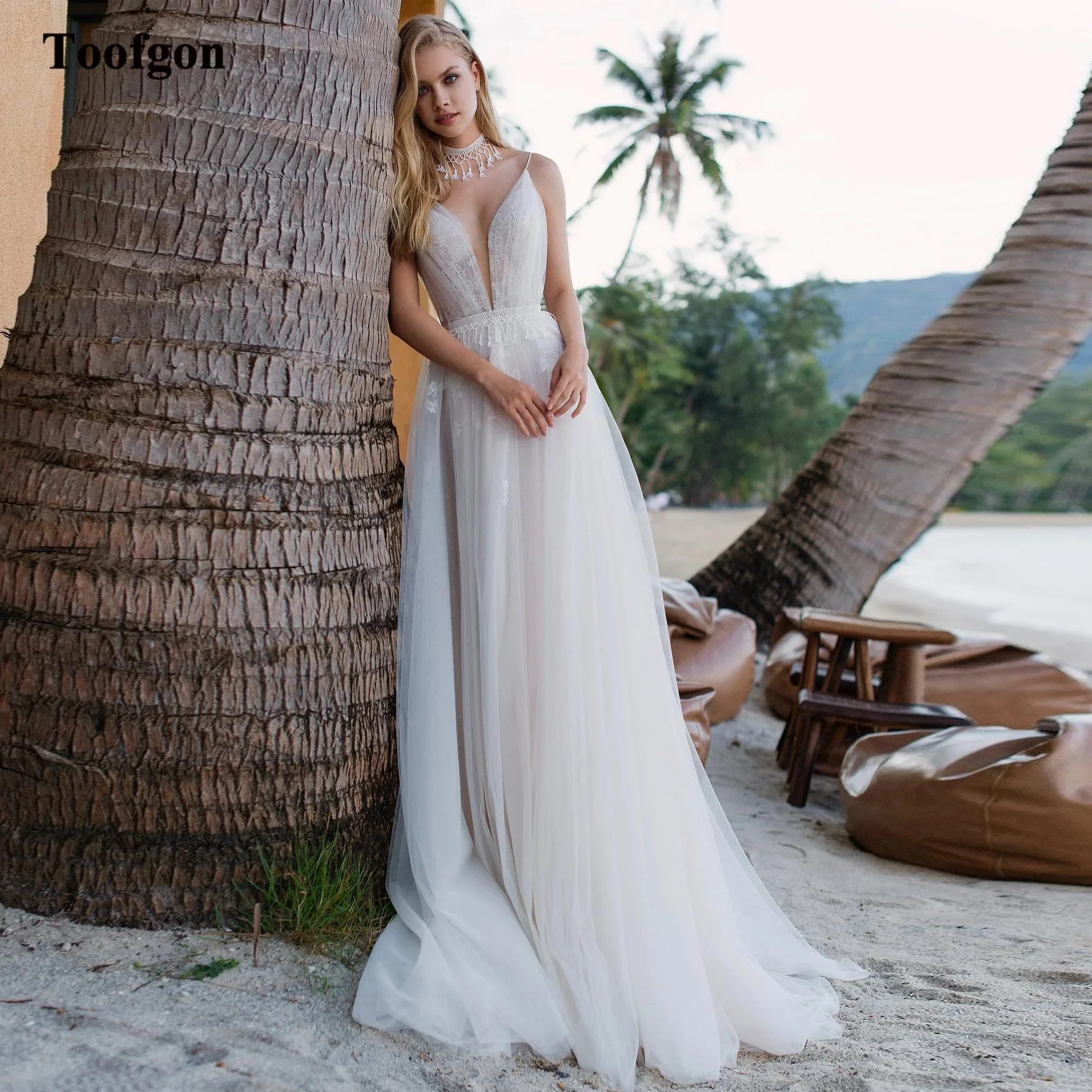 Toofgon Appliques Lace Boho Wedding Dresses Long Deep V-Neck Spaghetti Straps Bride Dress Bridal Weeding Gowns Vestido De Noiva
Toofgon Appliques Lace Boho Wedding Dresses Long Deep V-Neck Spaghetti Straps Bride Dress Bridal Weeding Gowns Vestido De Noiva