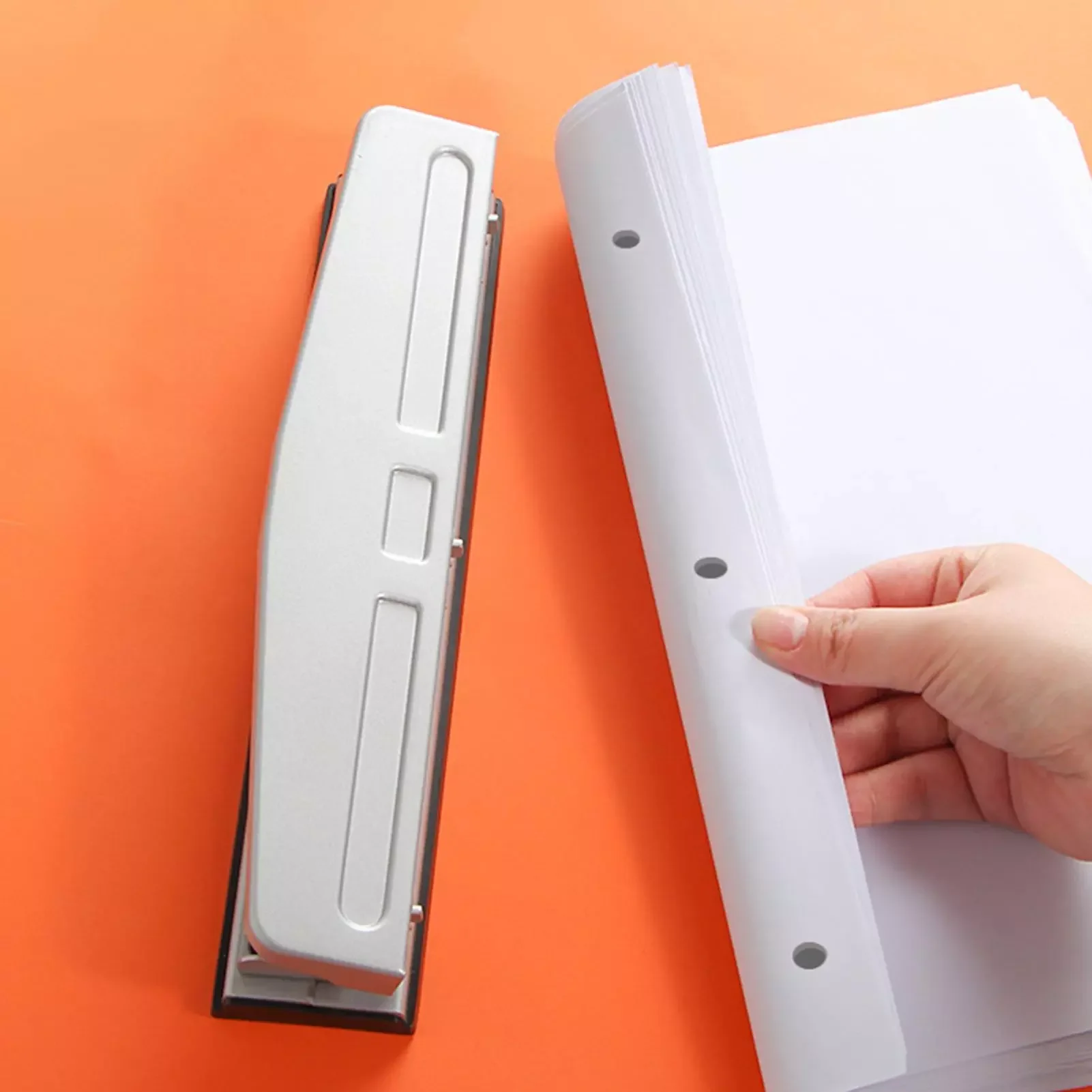 Three holes Manual Office puncher Office Loose leaf A4 paper Punch supplies Metal High quality stationery
Three holes Manual Office puncher Office Loose leaf A4 paper Punch supplies Metal High quality stationery