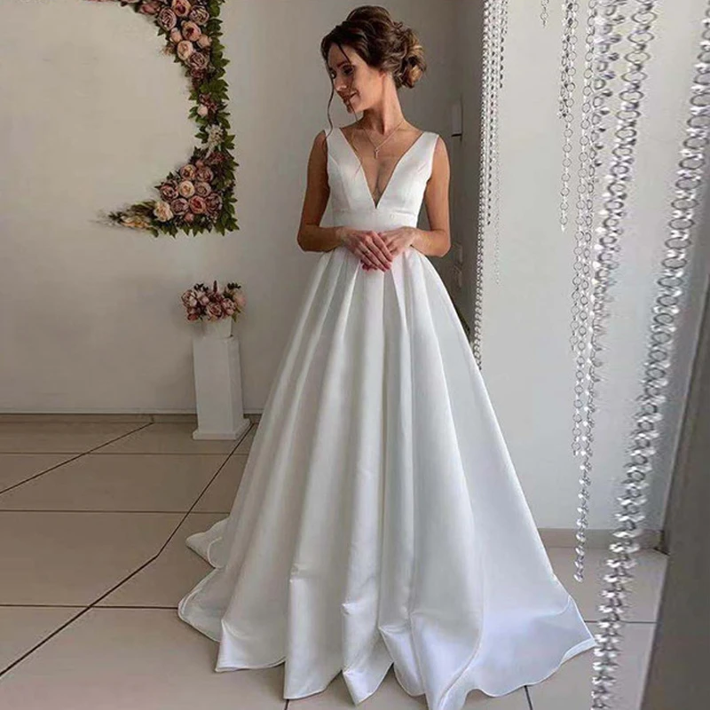 A-Line Satin Wedding Dresses 2022 V-Neck Sexy Backless Sweep Train Sleeveless Long White Bridal Gowns Plus Size Vestido de Novia
A-Line Satin Wedding Dresses 2022 V-Neck Sexy Backless Sweep Train Sleeveless Long White Bridal Gowns Plus Size Vestido de Novia