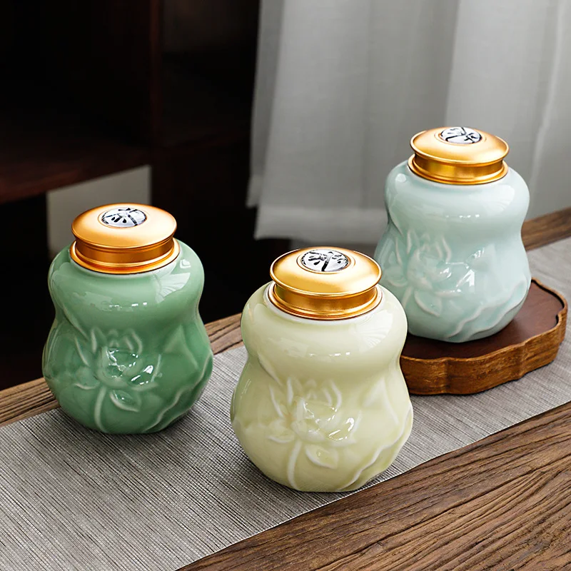 Lotus Ceramic Tea Pot Celadon Sealed Candy Nuts Coffee Beans Medicinal Material Storage Pot Home Tea Box Kitchen Food Container
Lotus Ceramic Tea Pot Celadon Sealed Candy Nuts Coffee Beans Medicinal Material Storage Pot Home Tea Box Kitchen Food Container
