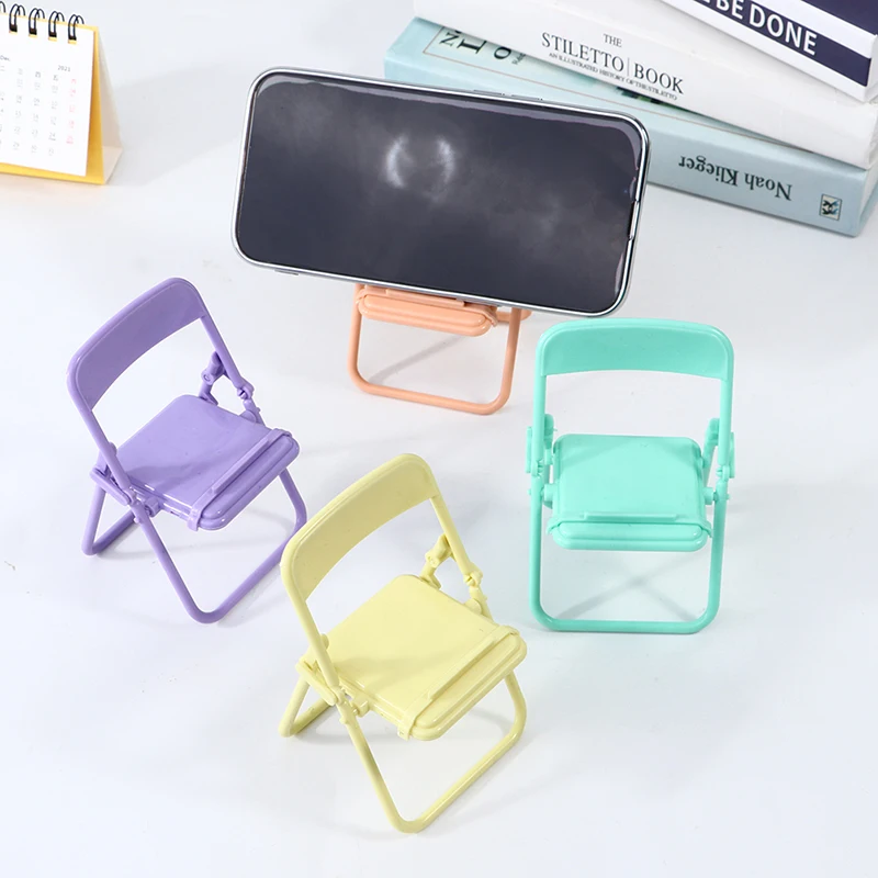 Cute Chair Mobile Phone Holder Foldable Desktop Cellphone Bracket Desktop Decor Lazy Bracket Catch-up Foldable Bracket 
Cute Chair Mobile Phone Holder Foldable Desktop Cellphone Bracket Desktop Decor Lazy Bracket Catch-up Foldable Bracket