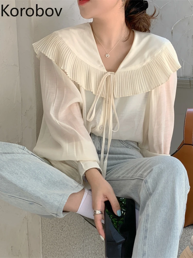 Korobov French Chic Temperament Blouses Pleated Doll Collar Lace Chemise Femme Long Sleeve Tops Autumn Blusas Mujer De Moda 2022
Korobov French Chic Temperament Blouses Pleated Doll Collar Lace Chemise Femme Long Sleeve Tops Autumn Blusas Mujer De Moda 2022