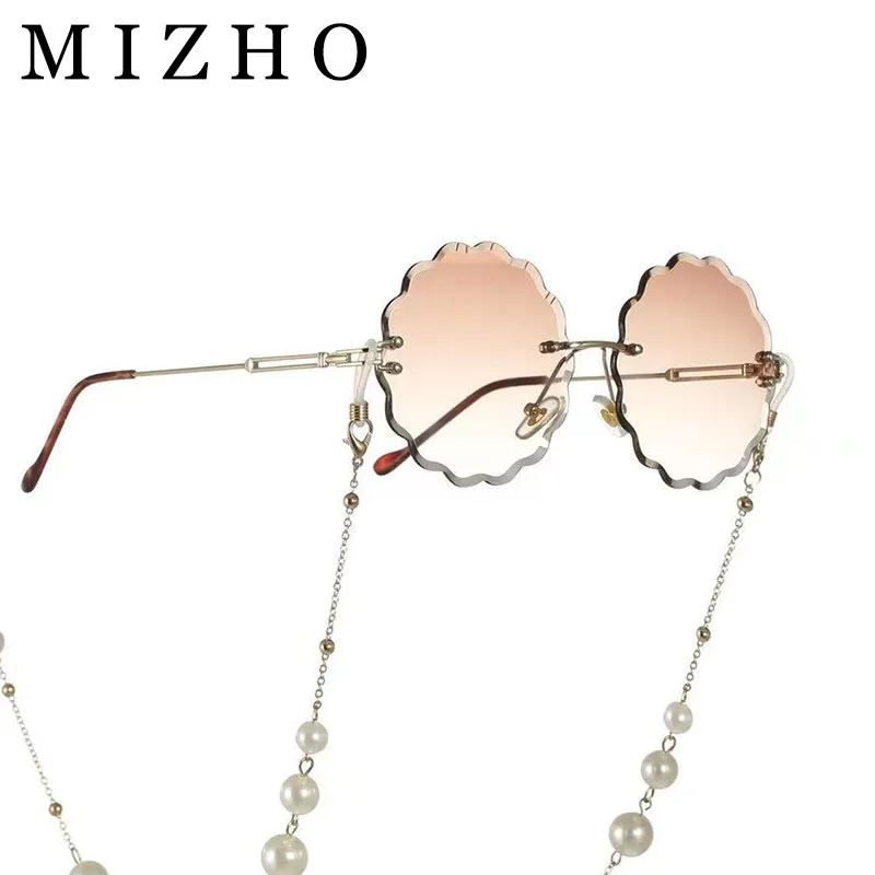 MIZHO 2022 Fashion Round Flower Sunglasses Women Rimless Chain Luxury Design Sun glasses 2021 Summer Style Female UV400
MIZHO 2022 Fashion Round Flower Sunglasses Women Rimless Chain Luxury Design Sun glasses 2021 Summer Style Female UV400