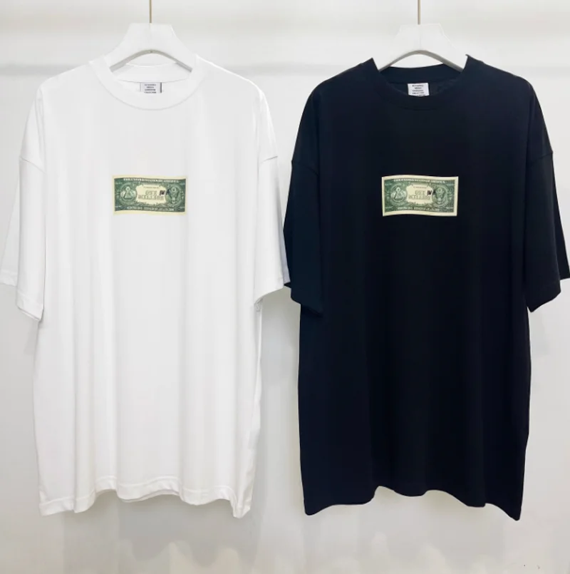 Vetements White T-shirt Men Women 1:1 High Quality American Dollar Logo Print Oversized Short Sleeves
Vetements White T-shirt Men Women 1:1 High Quality American Dollar Logo Print Oversized Short Sleeves