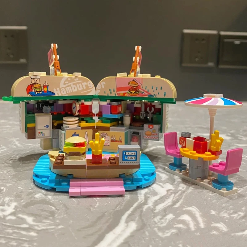 Toys for Children Amusement Park Hamburger Shop Fast Food Store Restaurant 3D Model DIY Mini Blocks Bricks Building 
Toys for Children Amusement Park Hamburger Shop Fast Food Store Restaurant 3D Model DIY Mini Blocks Bricks Building