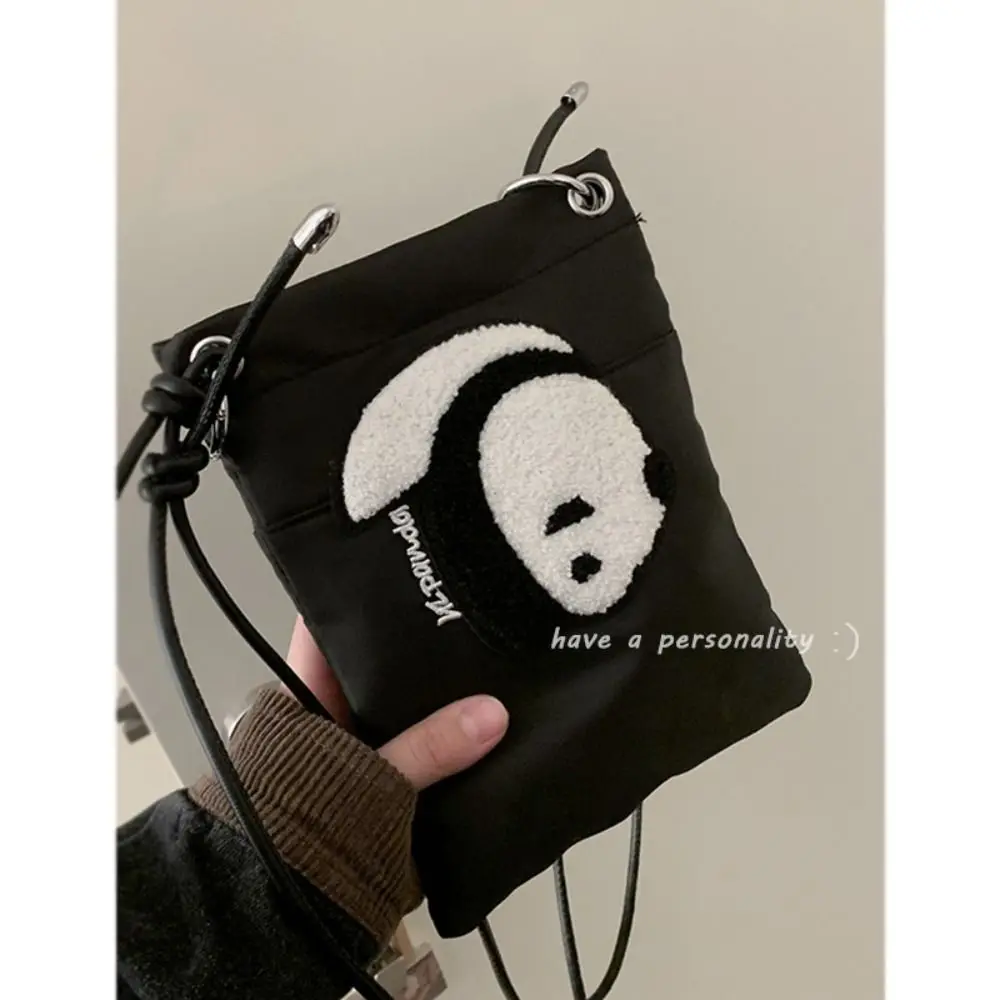 Black Cartoon Mobile Phone Bag New Large Capacity Fashion Versatile Crossbody Bag Nylon Canvas Student Shoulder Bag Women
Black Cartoon Mobile Phone Bag New Large Capacity Fashion Versatile Crossbody Bag Nylon Canvas Student Shoulder Bag Women
