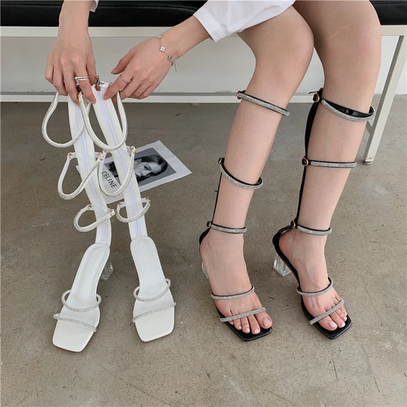 Fashion Women Sandals Bootes Narrown Band Rhinestone Chain Hollow Back Zipper Clear High Heels Back Zipper Dress Sandals Shoes
Fashion Women Sandals Bootes Narrown Band Rhinestone Chain Hollow Back Zipper Clear High Heels Back Zipper Dress Sandals Shoes