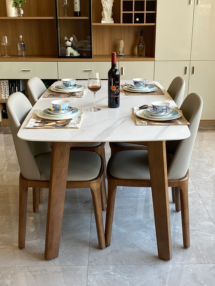 Italian imported rock plate solid wood dining table modern simple household small family Nordic style
Italian imported rock plate solid wood dining table modern simple household small family Nordic style