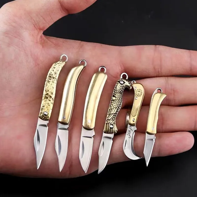 Portable Brass Folding Knife Keychain Pendant Gift Knife Self-Defense Multi-Function Sharp Unpacking Express Knife Cutting Tool
Portable Brass Folding Knife Keychain Pendant Gift Knife Self-Defense Multi-Function Sharp Unpacking Express Knife Cutting Tool