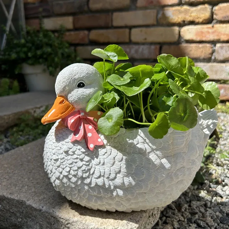 Flower Pot Resin Outdoor Courtyard Balcony Ornaments Cute Duck Modeling Hydroponic Decoration Creative Garden Cartoon Landscape
Flower Pot Resin Outdoor Courtyard Balcony Ornaments Cute Duck Modeling Hydroponic Decoration Creative Garden Cartoon Landscape