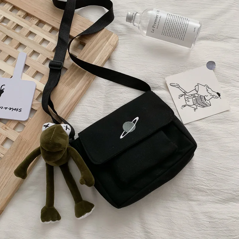 Korean Version INS Canvas Bag Female Student Classroom Crossbody Bag Planet Workwear Large Capacity Shoulder Bag
Korean Version INS Canvas Bag Female Student Classroom Crossbody Bag Planet Workwear Large Capacity Shoulder Bag