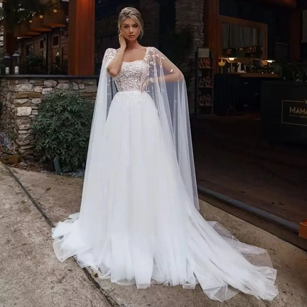 Ivory Princess Wedding Dresses With Cape Tulle Backless Sexy Boho Bride Gowns Vestidos de novia Party
Ivory Princess Wedding Dresses With Cape Tulle Backless Sexy Boho Bride Gowns Vestidos de novia Party