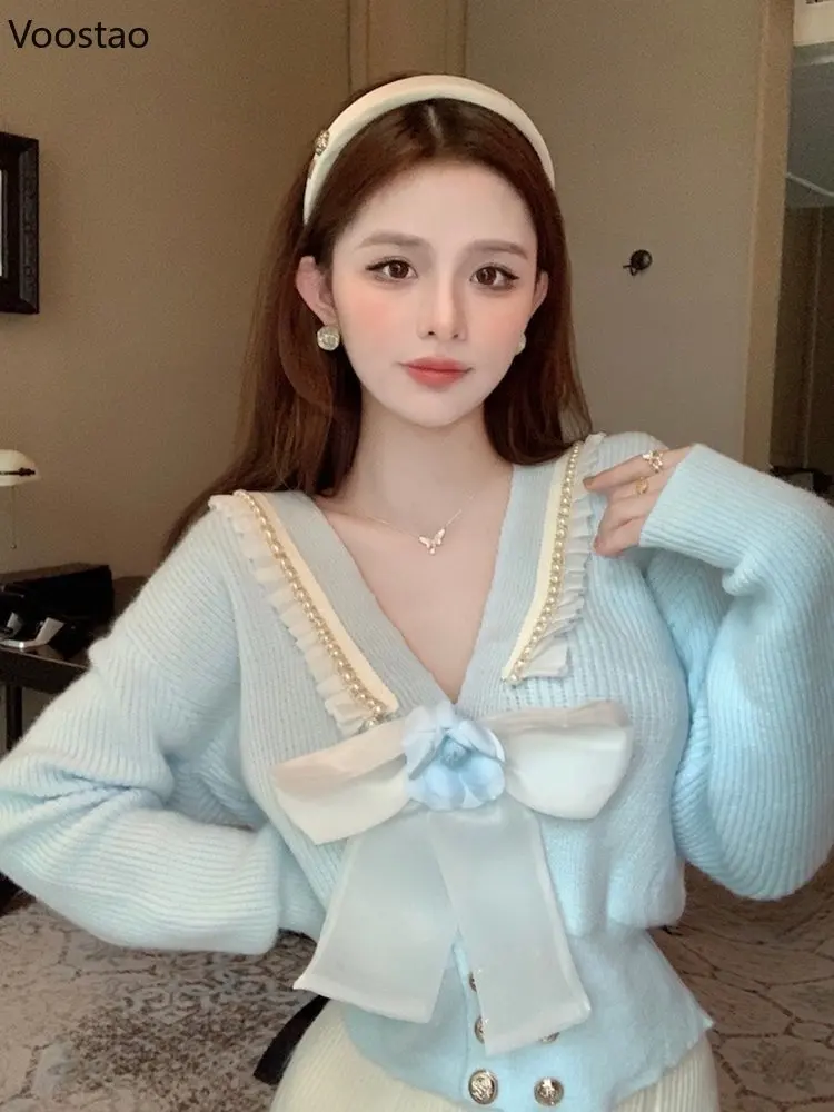 Spring Autumn Sweet Flower Bow Knitted Cardigan Gentle Elegant Women V-Neck Pearl Sweater Outerwear Female Casual Knitwear Tops
Spring Autumn Sweet Flower Bow Knitted Cardigan Gentle Elegant Women V-Neck Pearl Sweater Outerwear Female Casual Knitwear Tops