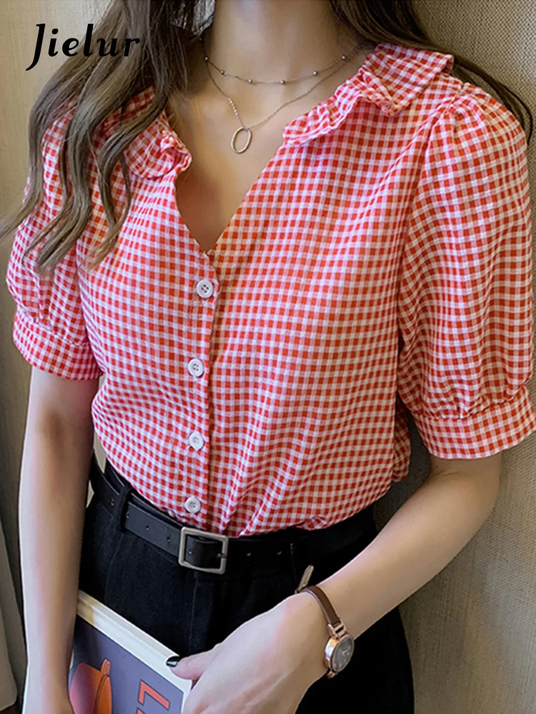 Jielur New Shirts Women Plaid Blouses 2022 Summer Short Sleeve Ruffled Collar Tops Casual Clothing Female Loose M-4XL Size 
Jielur New Shirts Women Plaid Blouses 2022 Summer Short Sleeve Ruffled Collar Tops Casual Clothing Female Loose M-4XL Size