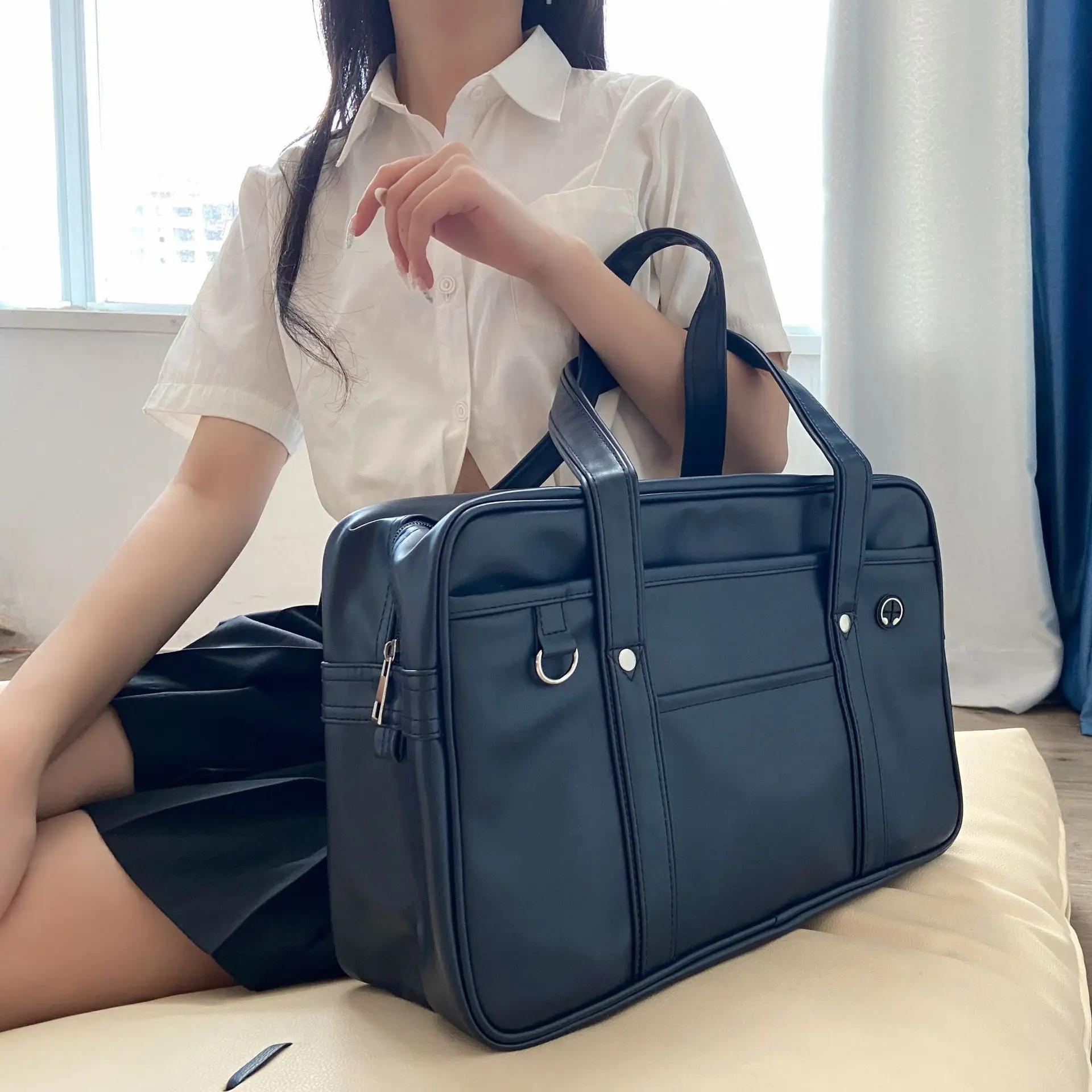 New Japanese Student One Shoulder Handheld Schoolbag PU Uniform Bag Durable and Waterproof COS Document Backpack for Men Women
New Japanese Student One Shoulder Handheld Schoolbag PU Uniform Bag Durable and Waterproof COS Document Backpack for Men Women