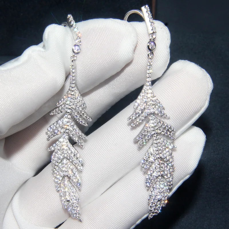 Sterling Silver Earrings for Women Crystal Diamond Feather Studs Long Retro Temperament
Sterling Silver Earrings for Women Crystal Diamond Feather Studs Long Retro Temperament