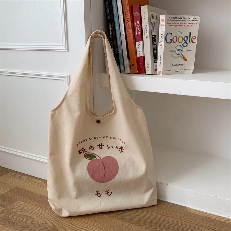 Honey peach Lola canvas bag female small fresh peach shoulder bag Japanese lovely college student portable shopping bag
Honey peach Lola canvas bag female small fresh peach shoulder bag Japanese lovely college student portable shopping bag