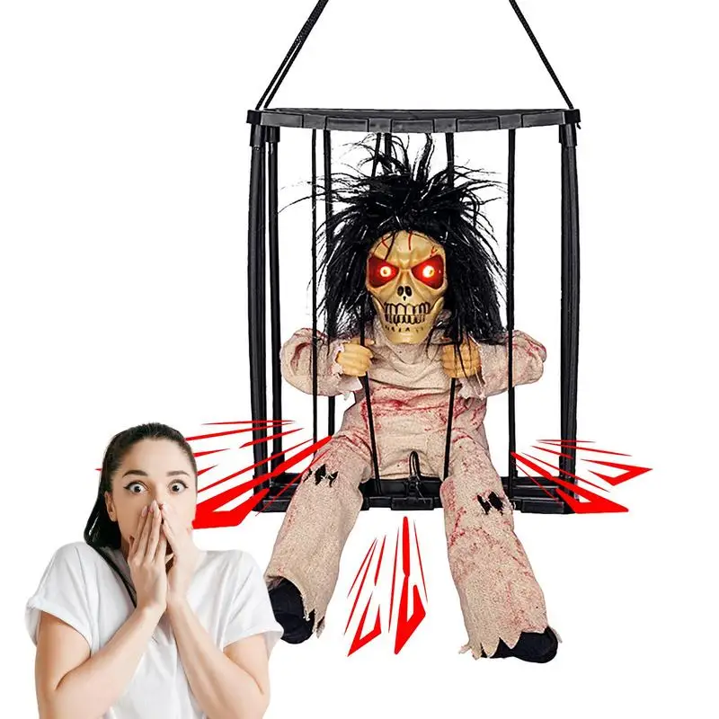 

Halloween Decoration Prisoner Ghost In Cage Scary Skull Prop Electric Skeleton Toy Glowing Eye Sound Doll Hangable Talking Ghost