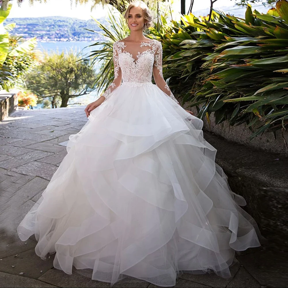 

Gorgeous Princess Wedding Dress 2022 Tiered Sheer Neck Long Sleeve Lace Appliques Sweep Train Bridal Gown Vestidos De Noiva
