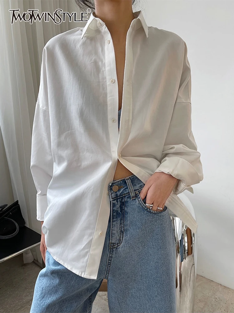 TWOTWINSTYLE Casual Solid Shirt For Women Lapel Collar Long Sleeve Button Through Minimalist Shirts Female Spring Clothing Style
TWOTWINSTYLE Casual Solid Shirt For Women Lapel Collar Long Sleeve Button Through Minimalist Shirts Female Spring Clothing Style
