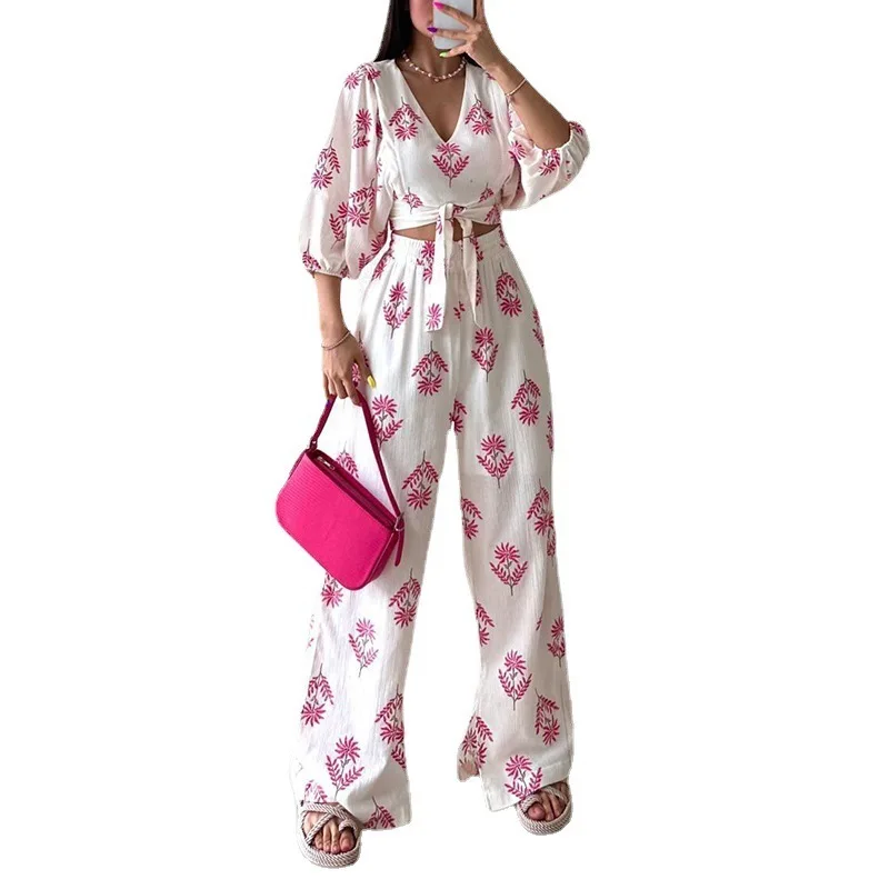 European and American casual suit summer new product V-neck puff sleeve printed top trousers ladies two-piece set
European and American casual suit summer new product V-neck puff sleeve printed top trousers ladies two-piece set