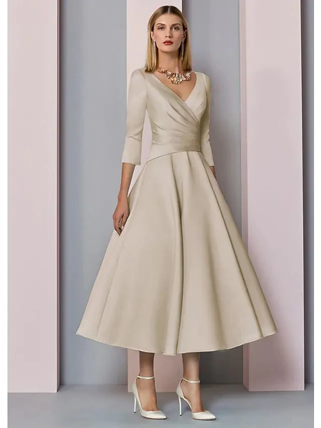 A-Line Mother of the Bride Dress Plus Size Elegant Vintage V Neck Tea Length Satin 3/4 Length Sleeve with Pleats
A-Line Mother of the Bride Dress Plus Size Elegant Vintage V Neck Tea Length Satin 3/4 Length Sleeve with Pleats