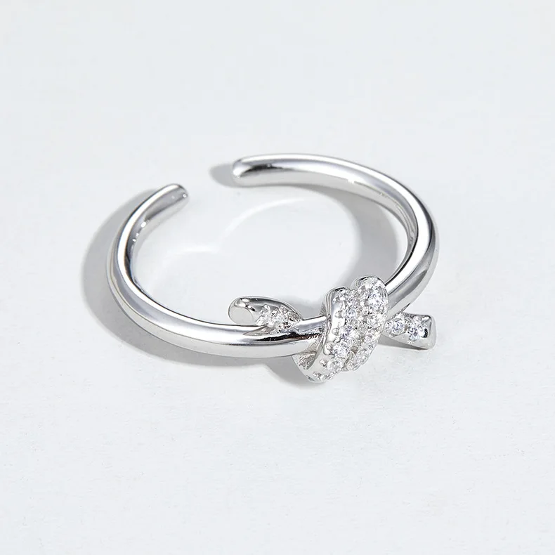 

Кольцо из стерлингового серебра = Корейская версия Кольца простой нишевой дизайн чувство узлом глянцевое темпераментное универсальное жен...
