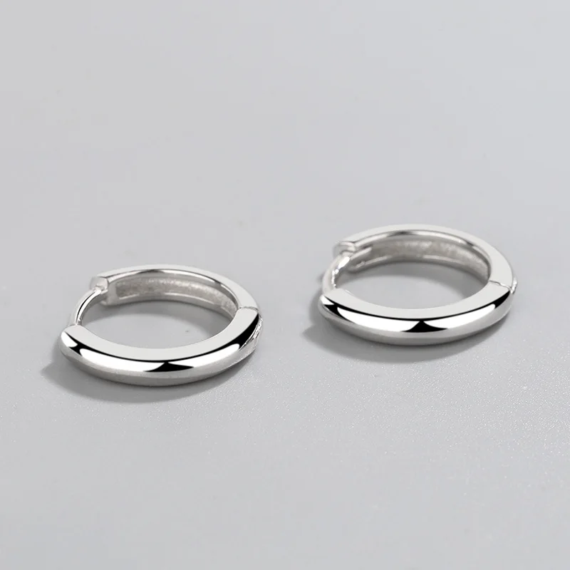 Sterling silver earrings simple glossy circle earrings women's light luxury niche design personality all-match ear jewelryry 
Sterling silver earrings simple glossy circle earrings women's light luxury niche design personality all-match ear jewelryry