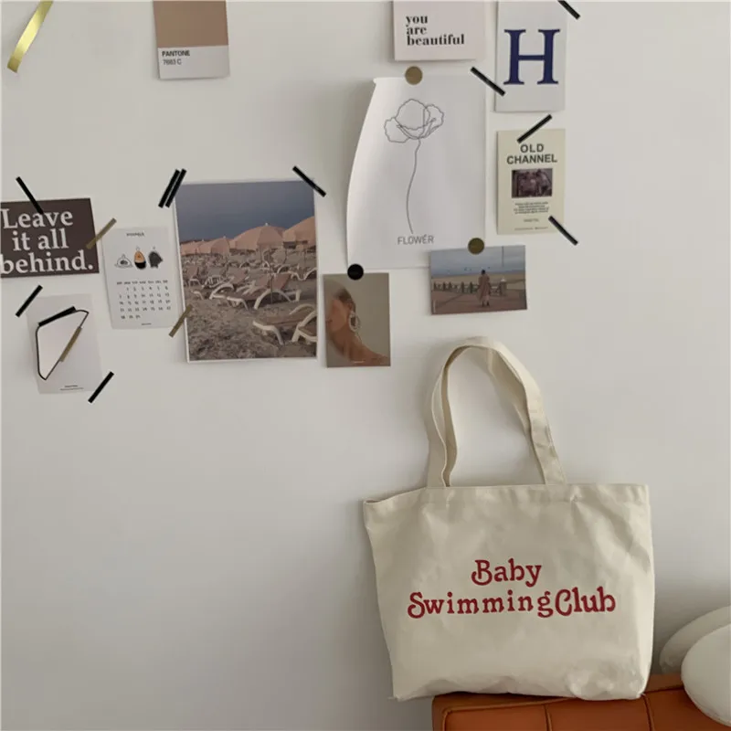New Retro Women's Shoulder Bag Simple Solid Color Letter Canvas Bag Women's Buckle Tote Bag Large Capacity Handbag Shopping Bag
New Retro Women's Shoulder Bag Simple Solid Color Letter Canvas Bag Women's Buckle Tote Bag Large Capacity Handbag Shopping Bag