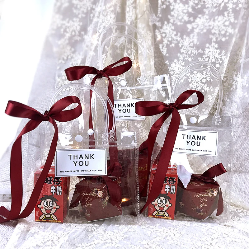 10pcs/lot Marriage and joyful PVC transparent bag carrying handbags bridesmaid bags with ribbons and boxes inside
10pcs/lot Marriage and joyful PVC transparent bag carrying handbags bridesmaid bags with ribbons and boxes inside