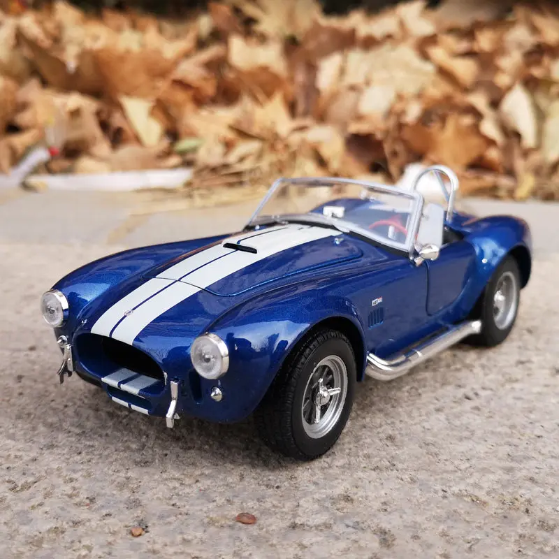 Модель автомобиля WELLY 1:24 Ford Shelby Cobra 427 S/C 1965, литой автомобиль и игрушечные автомобили, миниатюрная модель автомобиля в масштабе, игрушка для детей
Модель автомобиля WELLY 1:24 Ford Shelby Cobra 427 S/C 1965, литой автомобиль и игрушечные автомобили, миниатюрная модель автомобиля в масштабе, игрушка для детей