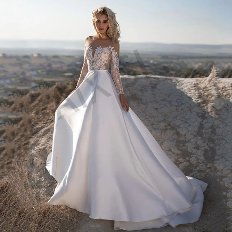 Beach White Wedding Dresses Appliques Satin Luxury Bride Vestido O Neck Full Sleeve A-Line Illusion Woman Robe de mariee
Beach White Wedding Dresses Appliques Satin Luxury Bride Vestido O Neck Full Sleeve A-Line Illusion Woman Robe de mariee