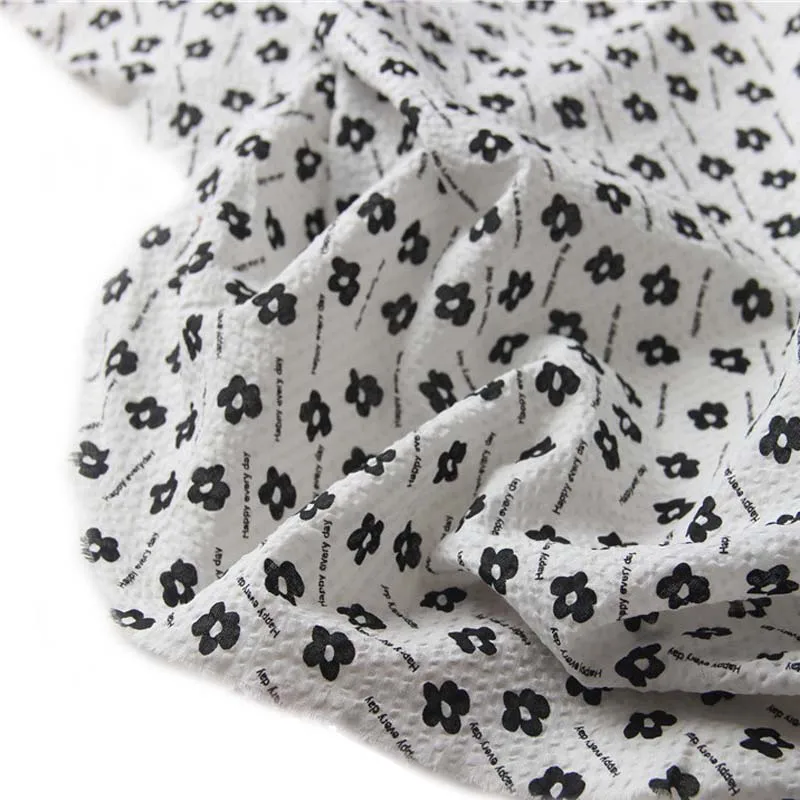 

100% хлопок соль усадка белый маленький черный цветок счастливые буквы тонкая ткань для летней одежды рубашка платье ручная работа