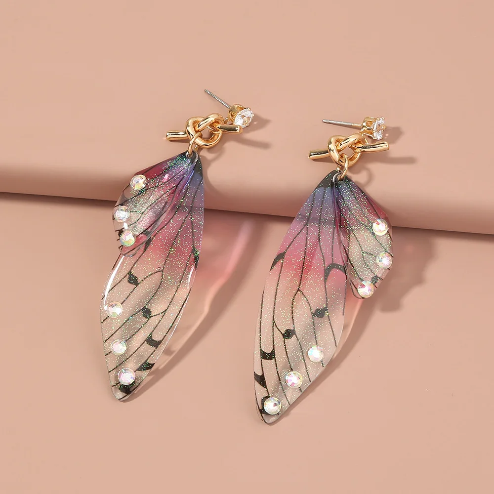 Rainbow Gradient Butterfly Wing Resin Drop Earrings for Women Rhinestone Elegant Temperament Fairy Earring Party Fashion Jewelry
Rainbow Gradient Butterfly Wing Resin Drop Earrings for Women Rhinestone Elegant Temperament Fairy Earring Party Fashion Jewelry
