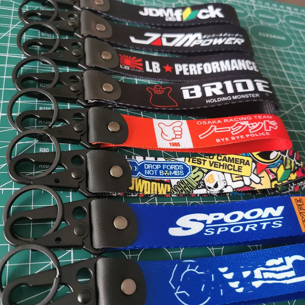 Accesorios Para Auto High-Quality JDM Racing Keychain Car Style Wrist Key Chain Key Rings Key Holder Heat Transfer Process FOR B
Accesorios Para Auto High-Quality JDM Racing Keychain Car Style Wrist Key Chain Key Rings Key Holder Heat Transfer Process FOR B