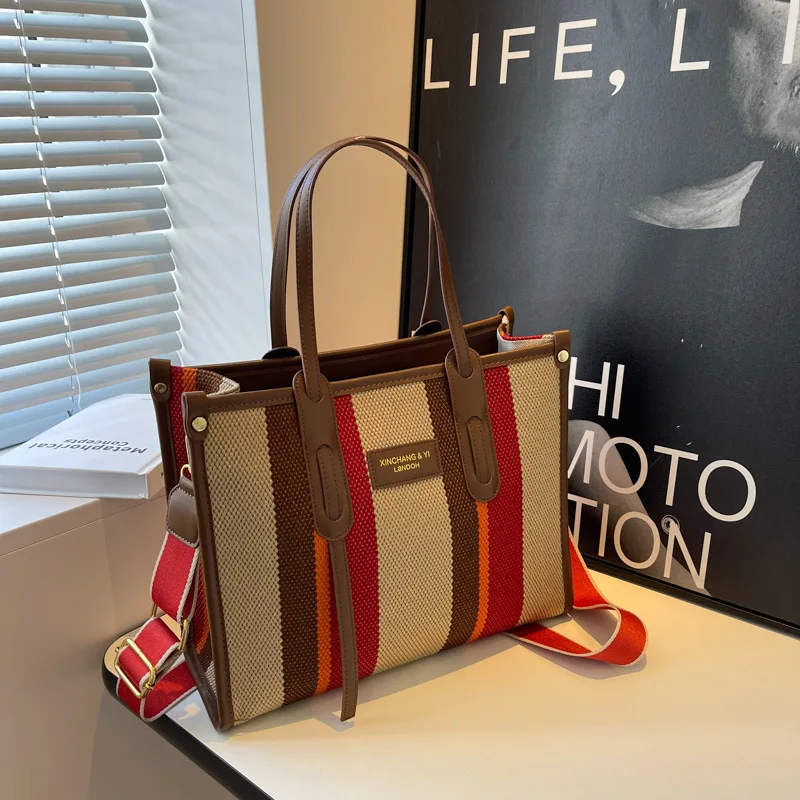 Large Capacity Handbag Women's Tote Bag 2023 New Fashion Canvas Color Crossbody Bag Striped Shoulder Crossbody Bag
Large Capacity Handbag Women's Tote Bag 2023 New Fashion Canvas Color Crossbody Bag Striped Shoulder Crossbody Bag