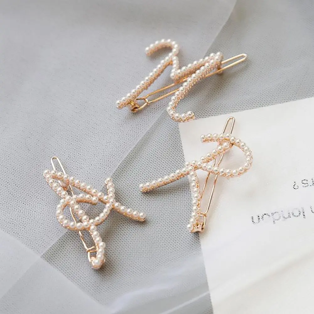 Fashion Girl Hair Accessories Letter Pins and Clips Pearl Hairpin Elegant Pin Barrettes Headwear Styling Hair Accessories
Fashion Girl Hair Accessories Letter Pins and Clips Pearl Hairpin Elegant Pin Barrettes Headwear Styling Hair Accessories