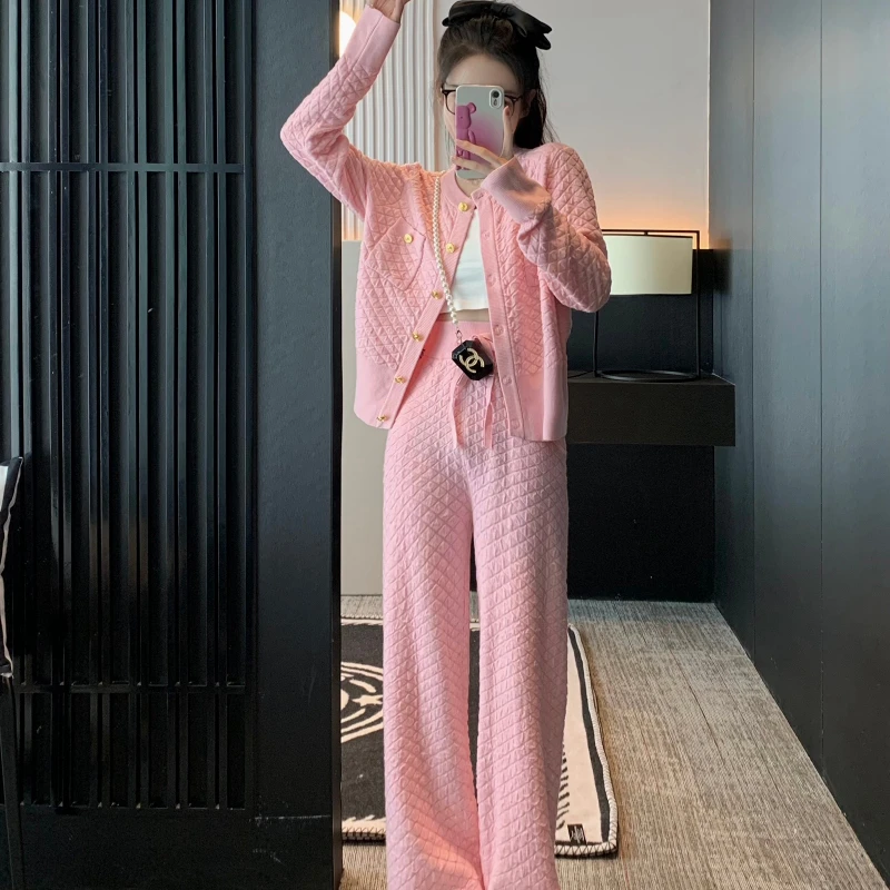 Women's Autumn and Winter New Round Neck Long Sleeve Loose Button Cardigan Top + Elastic Waist Tie Wide Leg Pants Two-piece Set
Women's Autumn and Winter New Round Neck Long Sleeve Loose Button Cardigan Top + Elastic Waist Tie Wide Leg Pants Two-piece Set