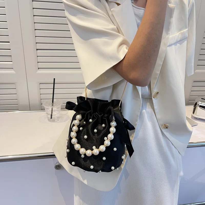 New European and American Fashion Chain Small Fragrance Pearl Portable Cross-body One Shoulder Bucket Bag Womens
New European and American Fashion Chain Small Fragrance Pearl Portable Cross-body One Shoulder Bucket Bag Womens