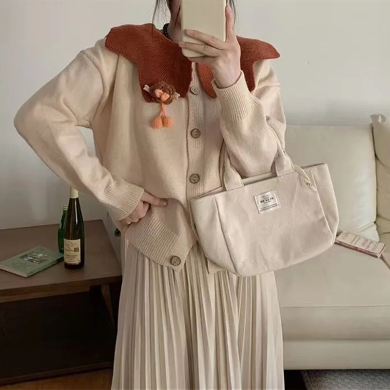 Spring Autumn New Korean Ruffled Sweater Jacket Versatile Knitted Women Cardigan Tops
Spring Autumn New Korean Ruffled Sweater Jacket Versatile Knitted Women Cardigan Tops
