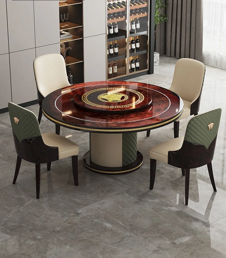 Italian light luxury Versace high light piano paint baking round dining table and chair combination villa designer brand furnitu
Italian light luxury Versace high light piano paint baking round dining table and chair combination villa designer brand furnitu