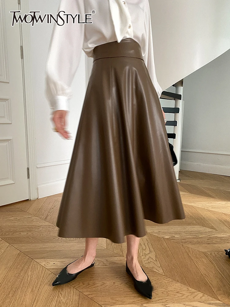 TWOTWINSTYLE Patchwork Folds Skirts For Women High Waist Loose Casual Solid PU Leather A Line Skirt Female Fashion Clothing 2023
TWOTWINSTYLE Patchwork Folds Skirts For Women High Waist Loose Casual Solid PU Leather A Line Skirt Female Fashion Clothing 2023
