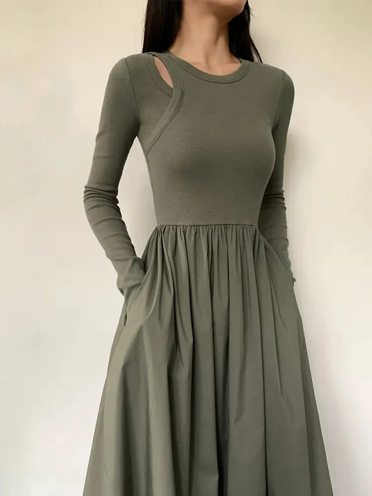 Трикотажное платье-макси с круглым вырезом и карманами
Трикотажное платье-макси с круглым вырезом и карманами