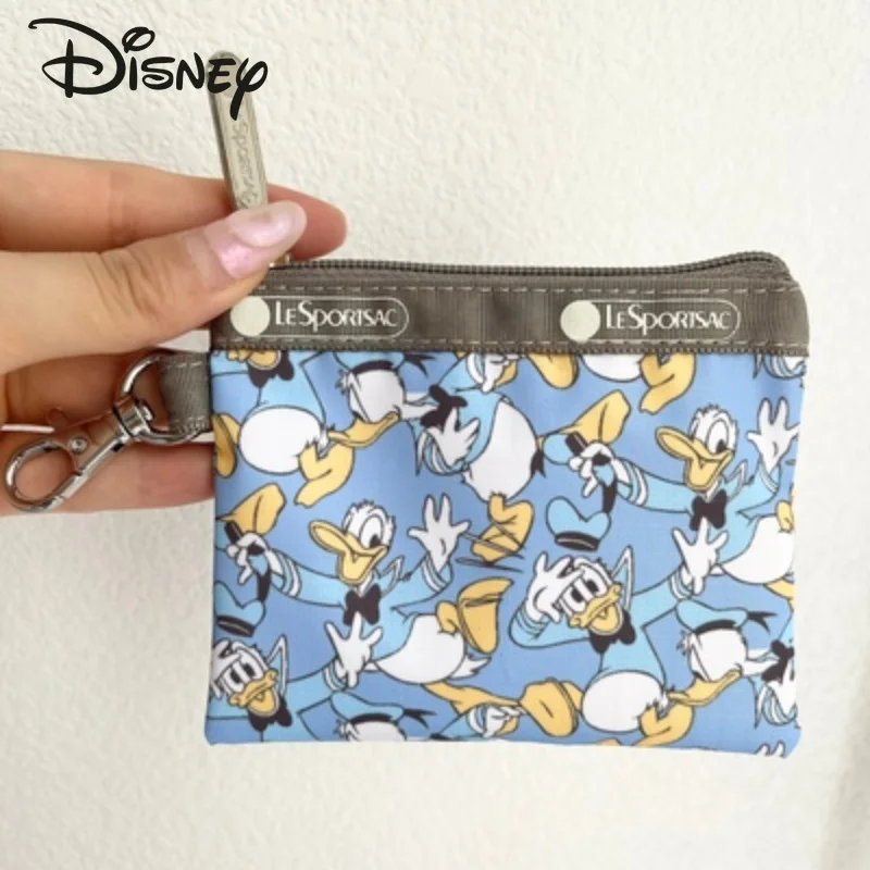Новый Кошелек Disney с Микки Маусом мисс мультяшный кошелек многофункциональная сумка для хранения нейлоновая застежка-молния милый детский ...
Новый Кошелек Disney с Микки Маусом мисс мультяшный кошелек многофункциональная сумка для хранения нейлоновая застежка-молния милый детский ...