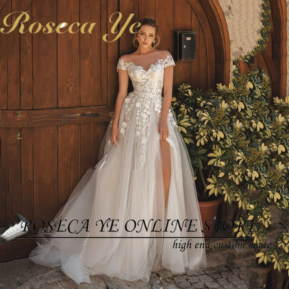 

Roseca Ye Vintage Tulle Wedding Dress Light Champagne Lace Applique Short Sleeves Beide Dress High Slit Sexy Bridal Dress 2022