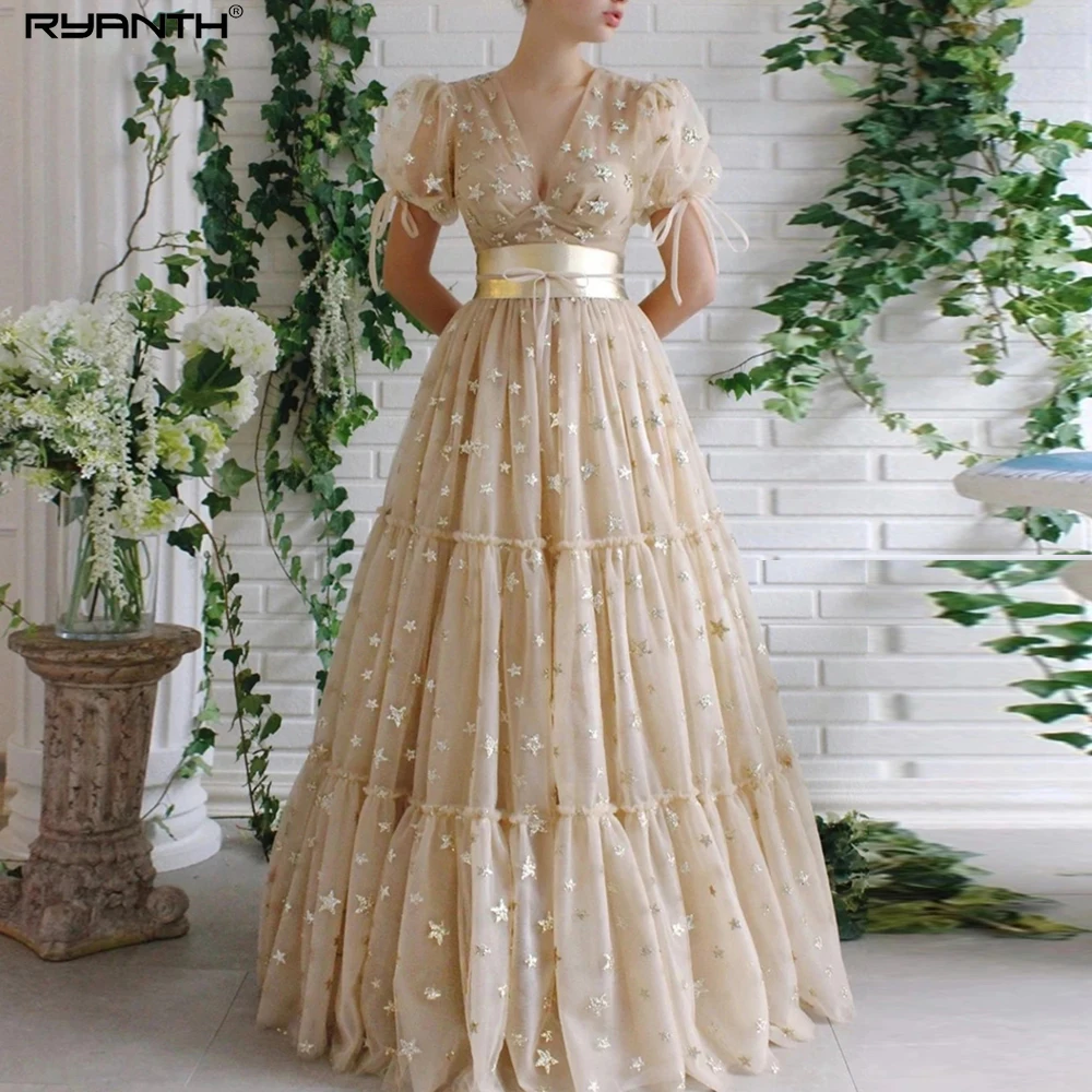 Ryanth Women's Champagne Cap Sleeves Elegant Prom Dresses A-Line V Neck Star Sequins Tulle Homecoming Gowns Bow Waistband 2023
Ryanth Women's Champagne Cap Sleeves Elegant Prom Dresses A-Line V Neck Star Sequins Tulle Homecoming Gowns Bow Waistband 2023